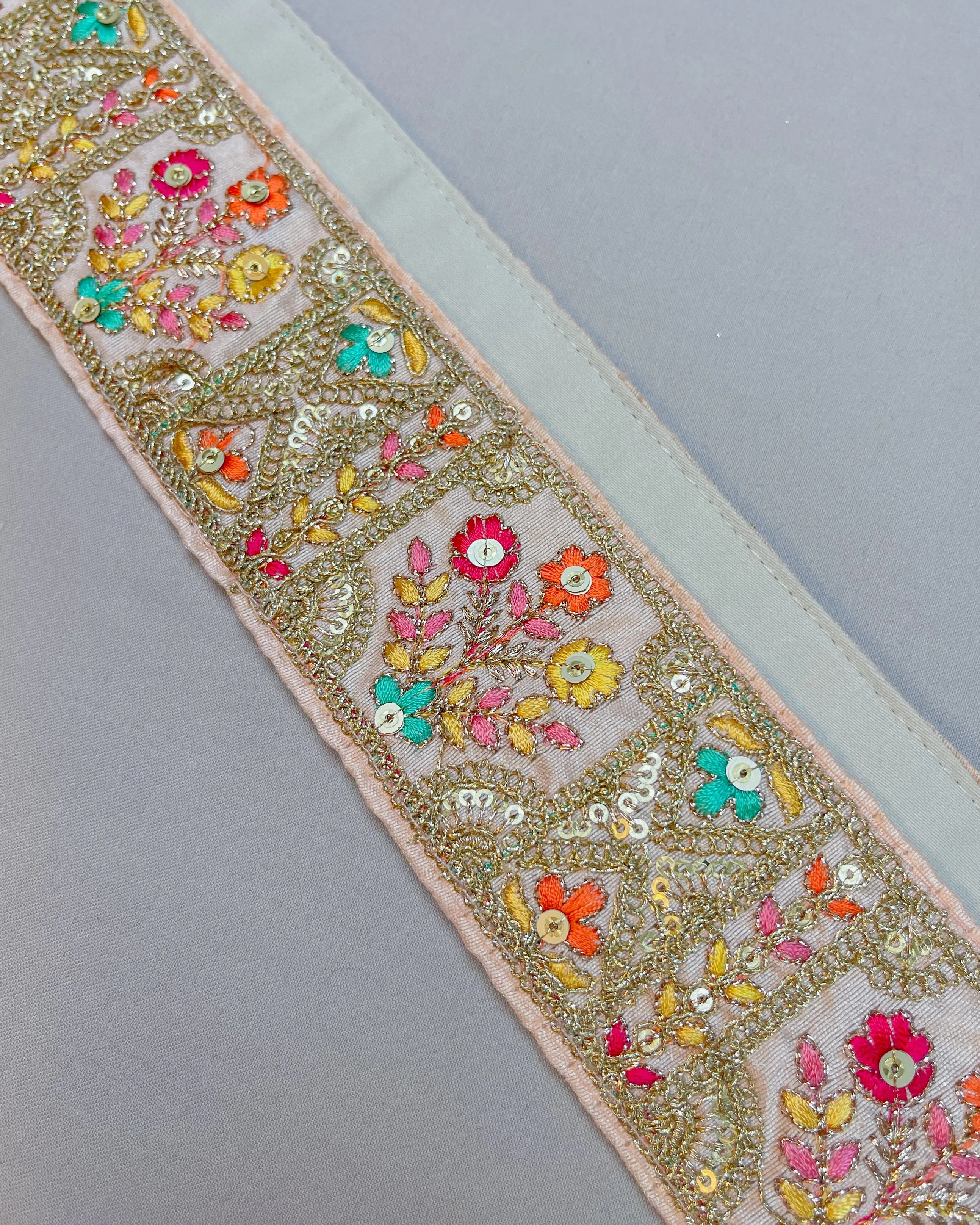 Baby pink bohemian embroidered obi belt with tassels